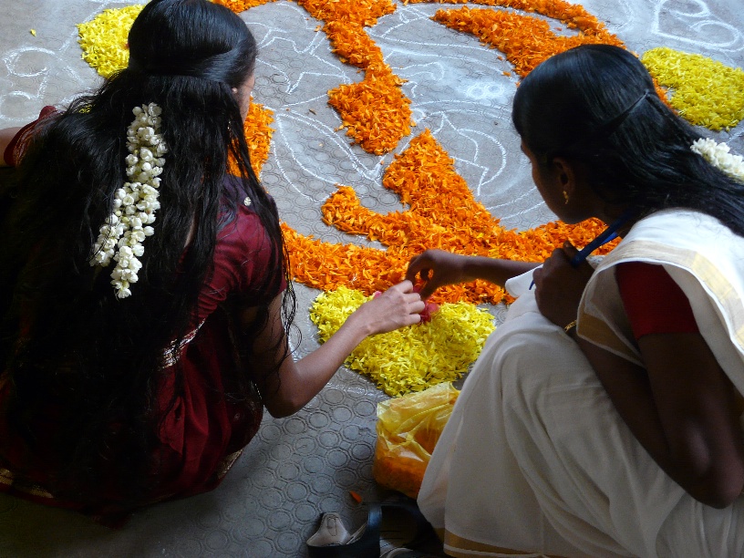 In the foyer of the Renewal Centre: The traditional ritual of laying Pookalam (a floral carpet). 